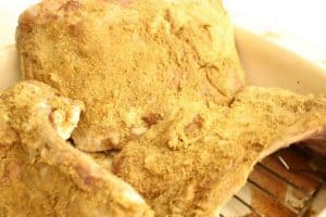 Partially cooked mechoui
