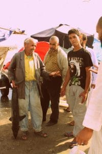 An old fisherman selling a shark in Essaouira
