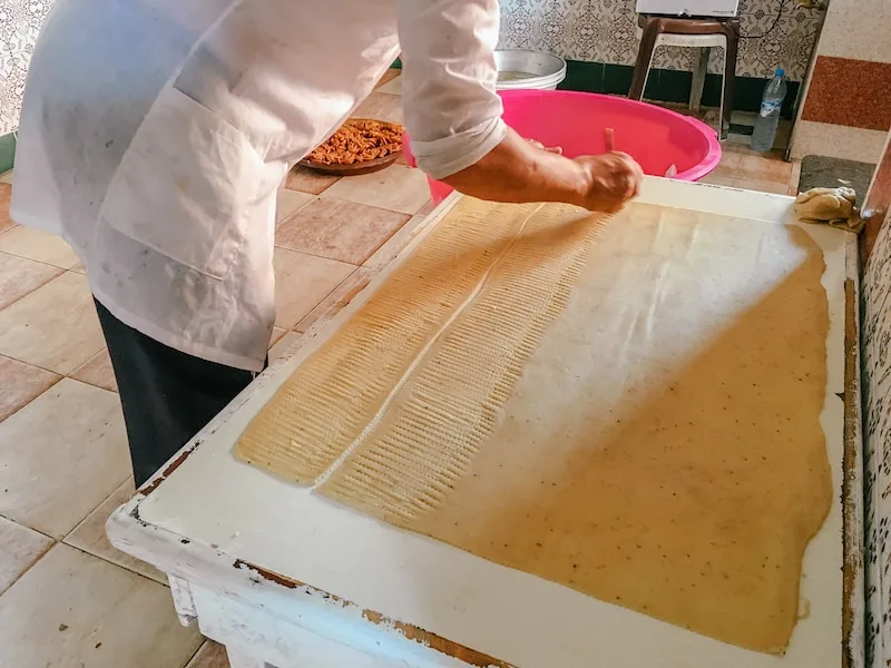 Cutting Chebakia Dough.jpg