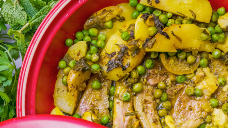 lamb and potato tagine in a red dish