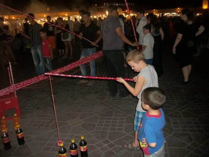 Djem al Fna at night with kids