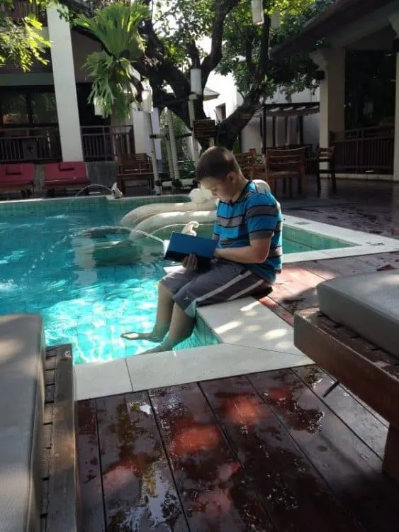 Reading by the Pool in Thailand