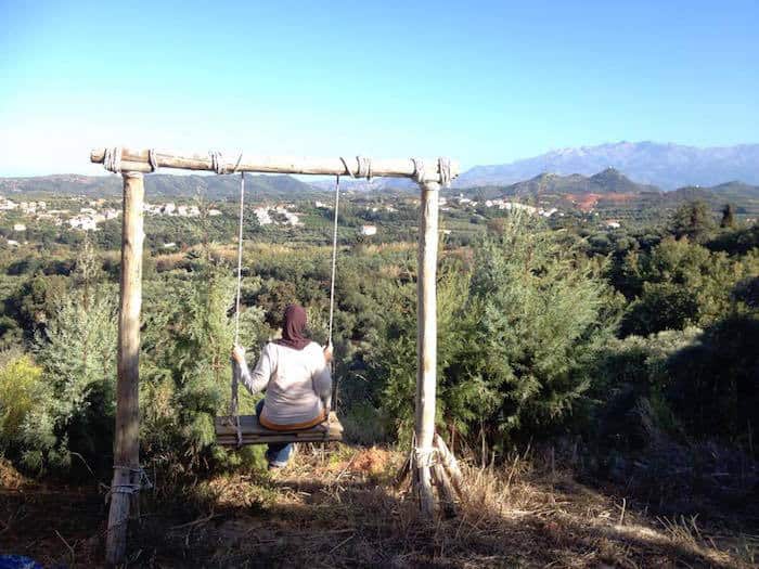 Sitting on a swing in Crete