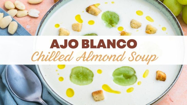 Ajo Blanco served in agreen bowl with the text Ajo Blanco - Chilled Almond Soup