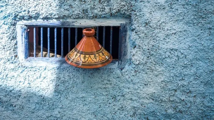 Top of a Tajine sitting by a grated window in Tangier Morocco