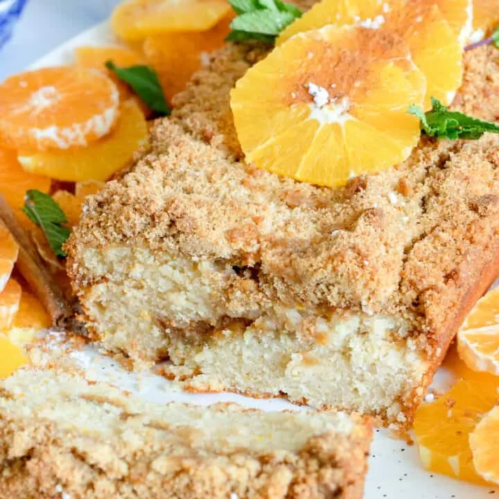 Orange and cinnamon cake with a cut slice