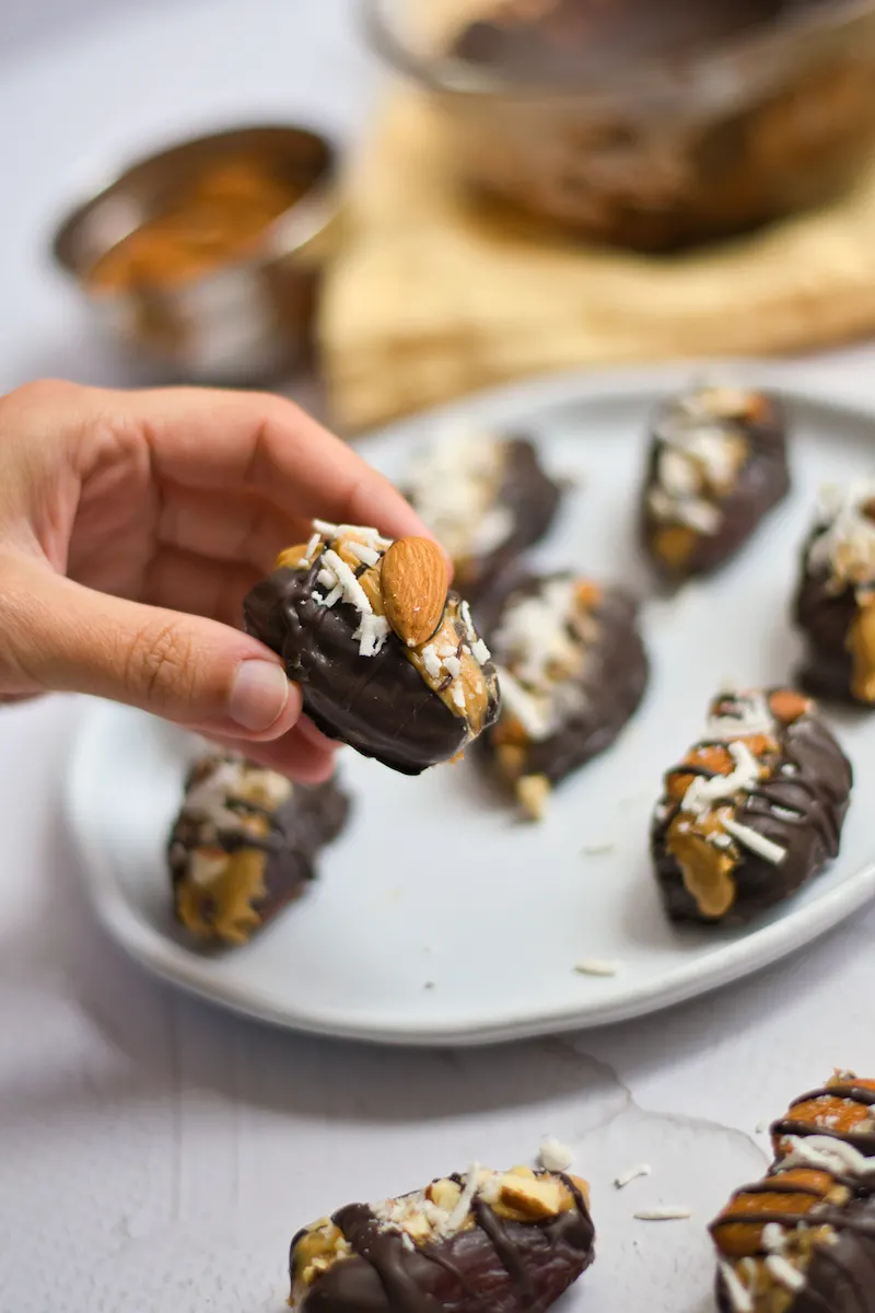 Peanut butter stuffed medjool dates on a plate