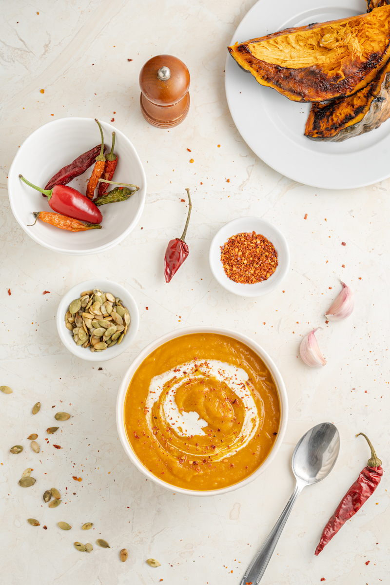 Bowl of Pumpkin Soup with hot peppers and roast pumpkin