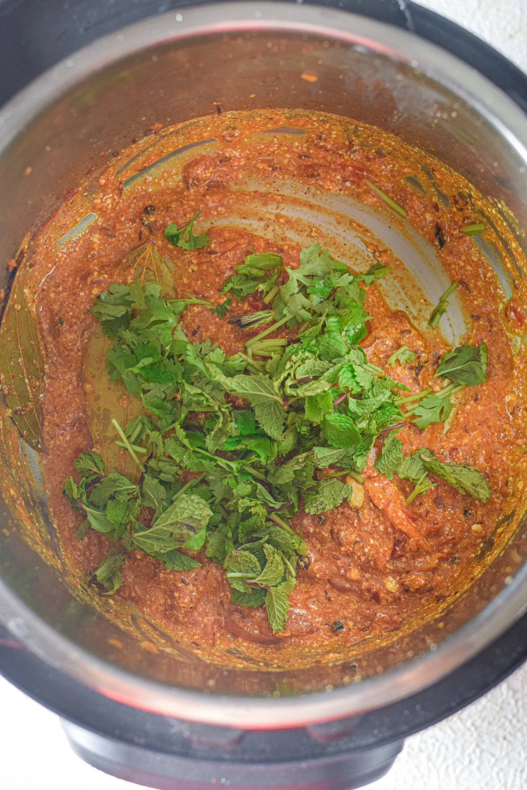 coriander leaves with other ingredients of biryani recipe