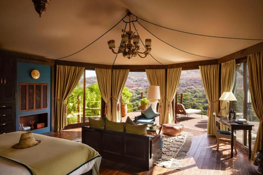 a room at Kasbah Tamadot overlooking a beautiful view excellent for a luxury Morocco honeymoon