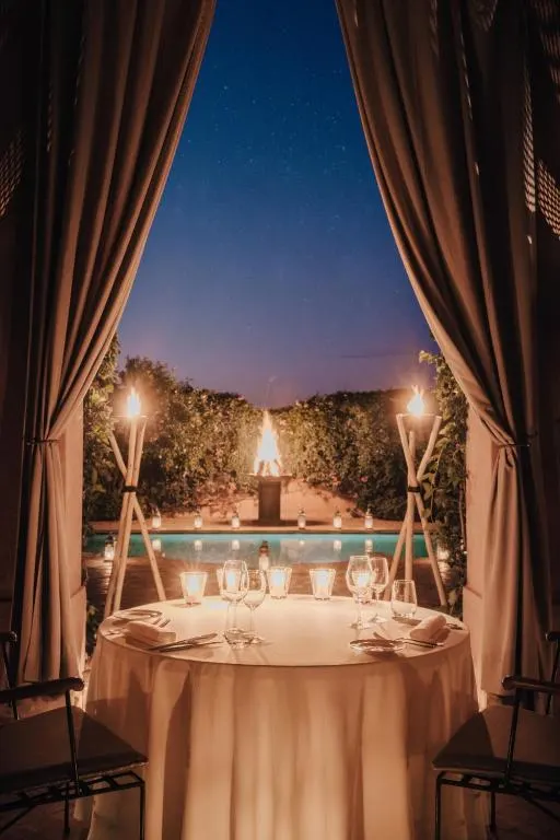 dinner table for two at Amanjena resort for a luxury Morocco honeymoon