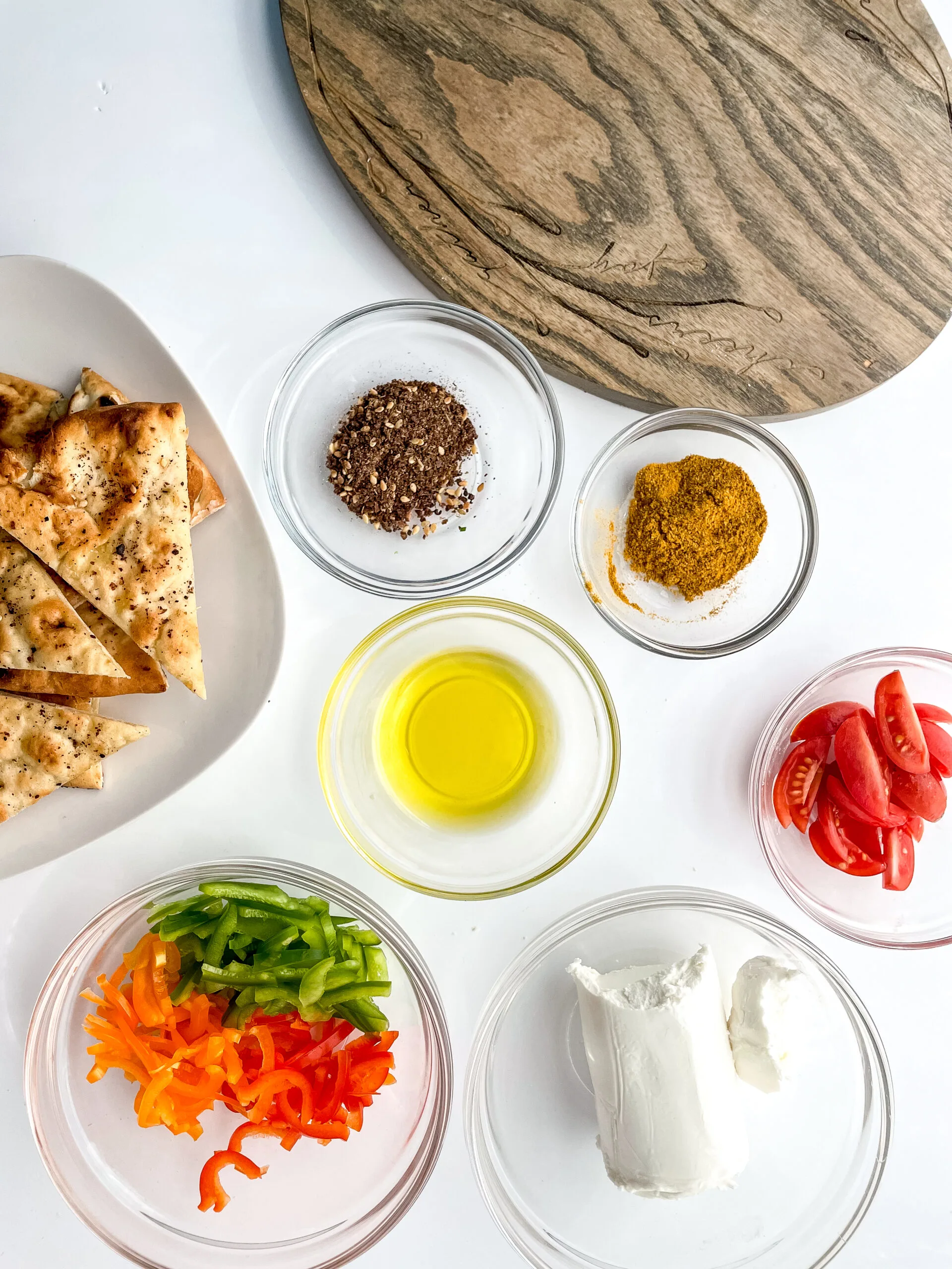 Naan bread with other ingredients for recipe using za'tar