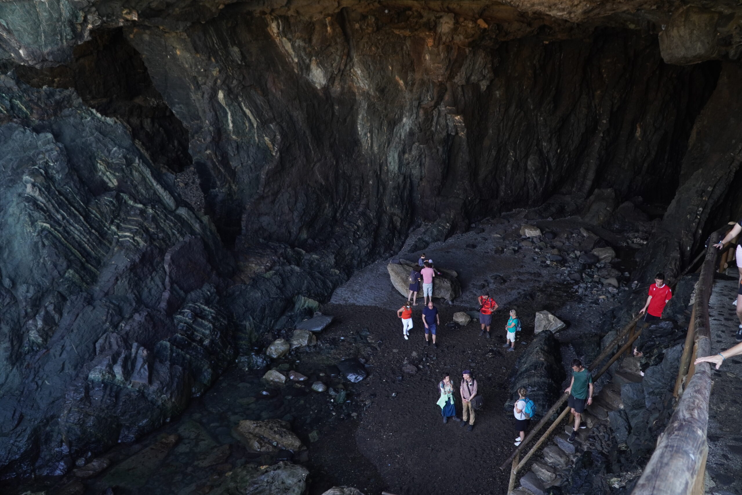 tourist visiting Ajuy caves one of the exciting things to do in Fuerteventura with kids