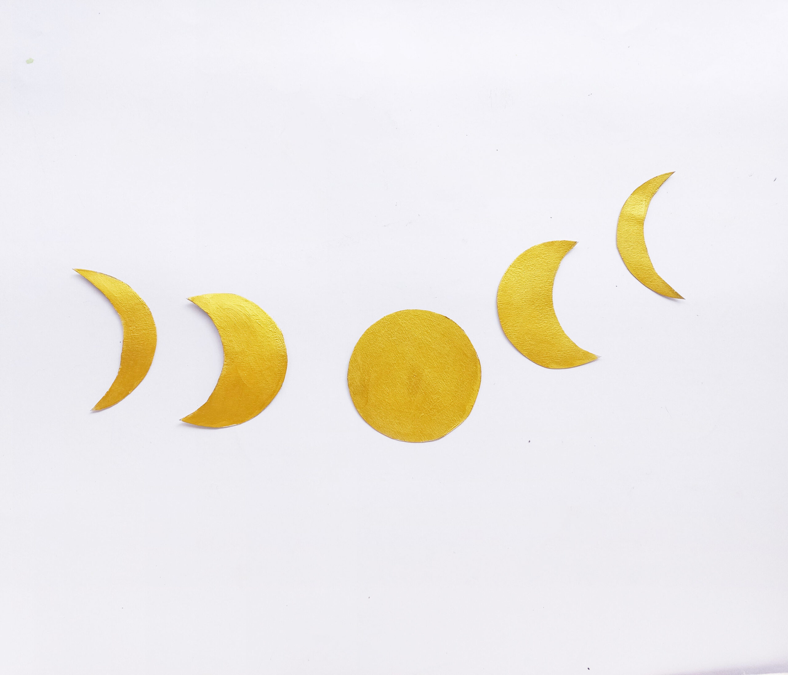moon cut out with golden paint