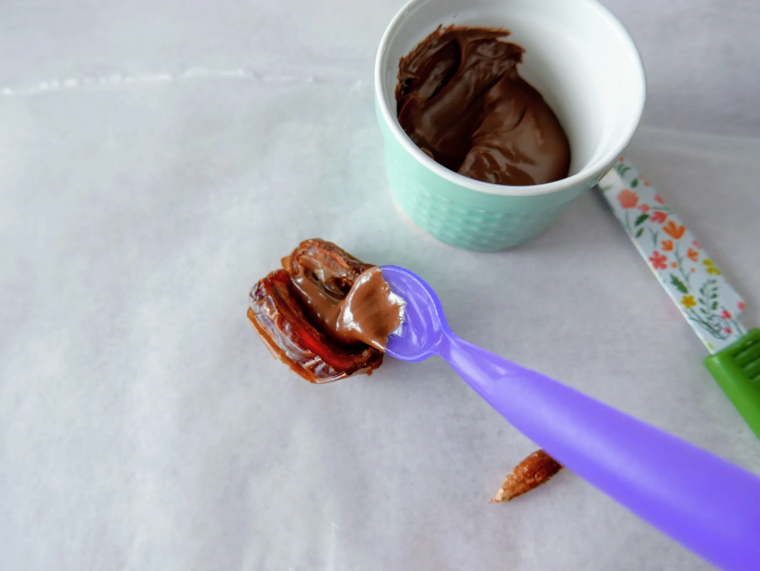 dates and spoon with nutella