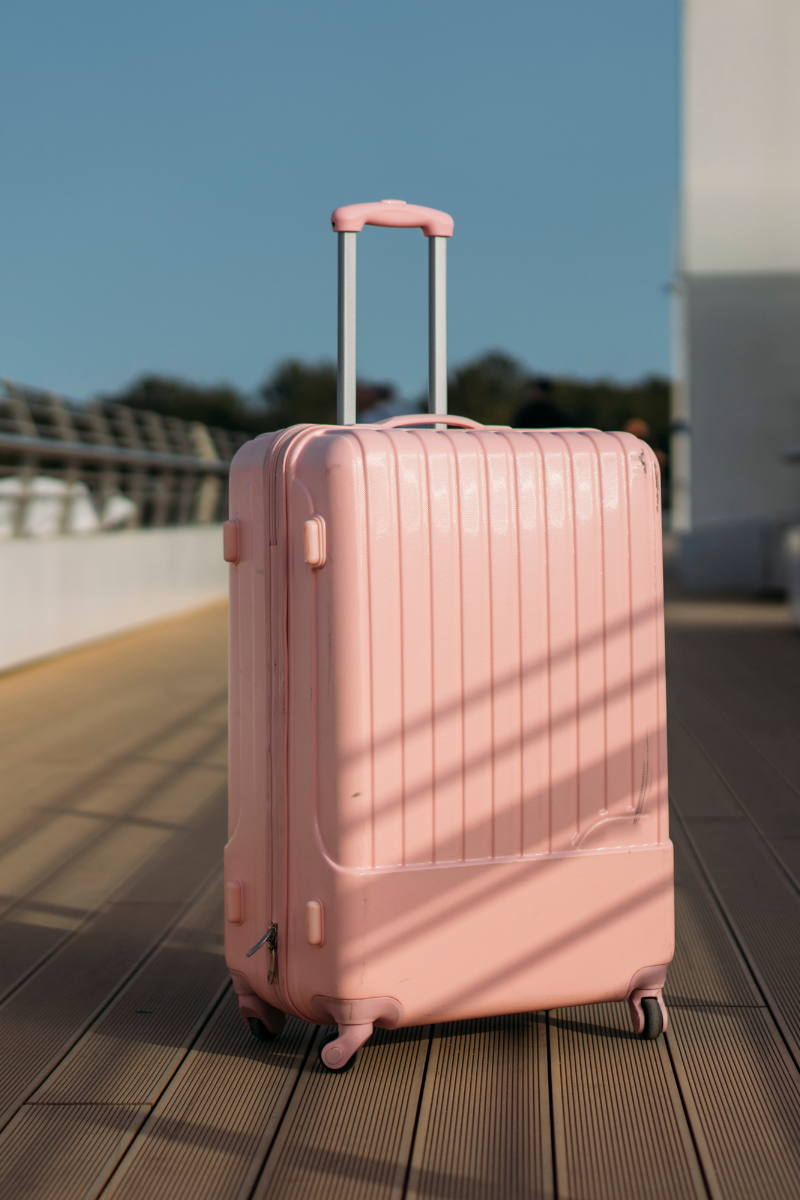 a pink carry on suitcase for Morocco vacation