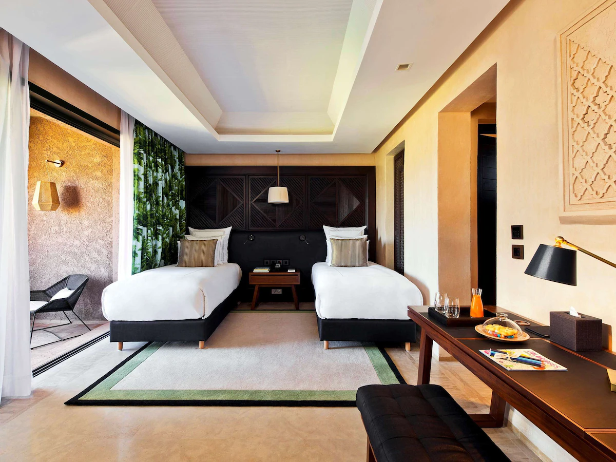 A suite in Fairmont Royal Palm Marrakech with Frette Italian sheets, premium bedding, pillowtop beds, in-room safe