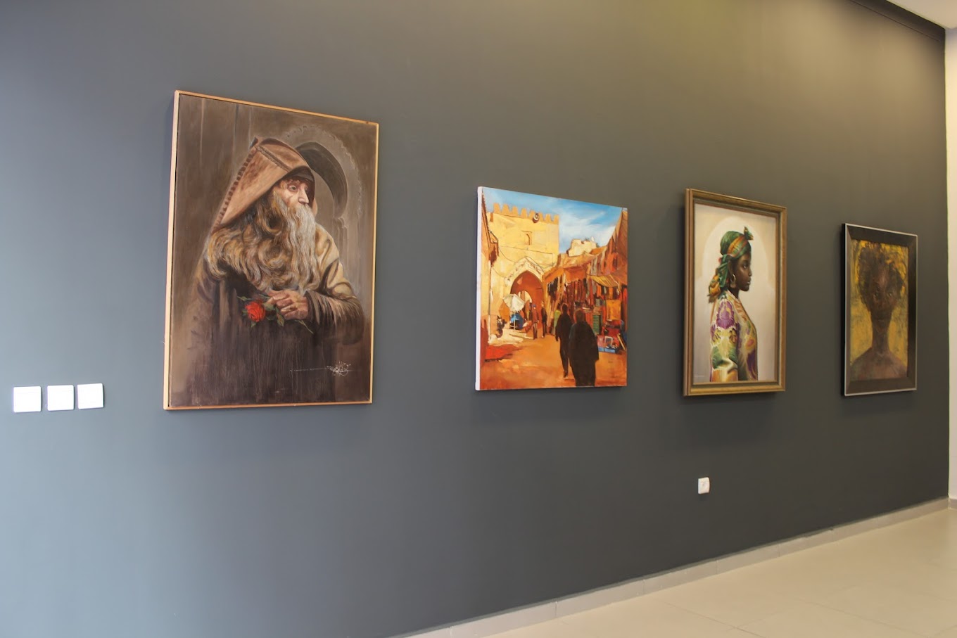 Displayed artworks in the Medina Art Gallery primarily exhibiting works by contemporary Moroccan artists & old works with a Western lens
