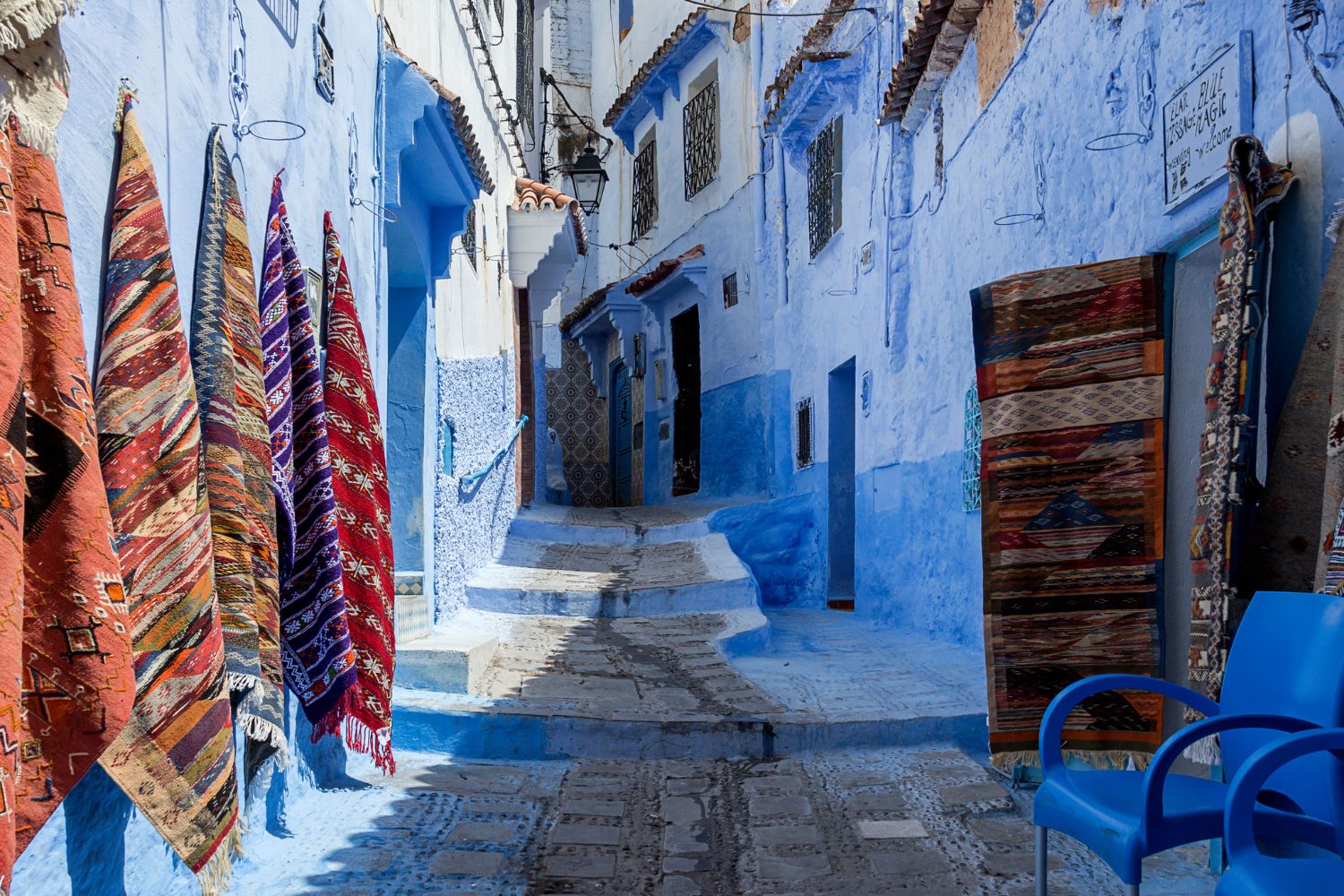 A maze of blue and white buildings with beautiful doors in the Medina of Tangier, Morocco