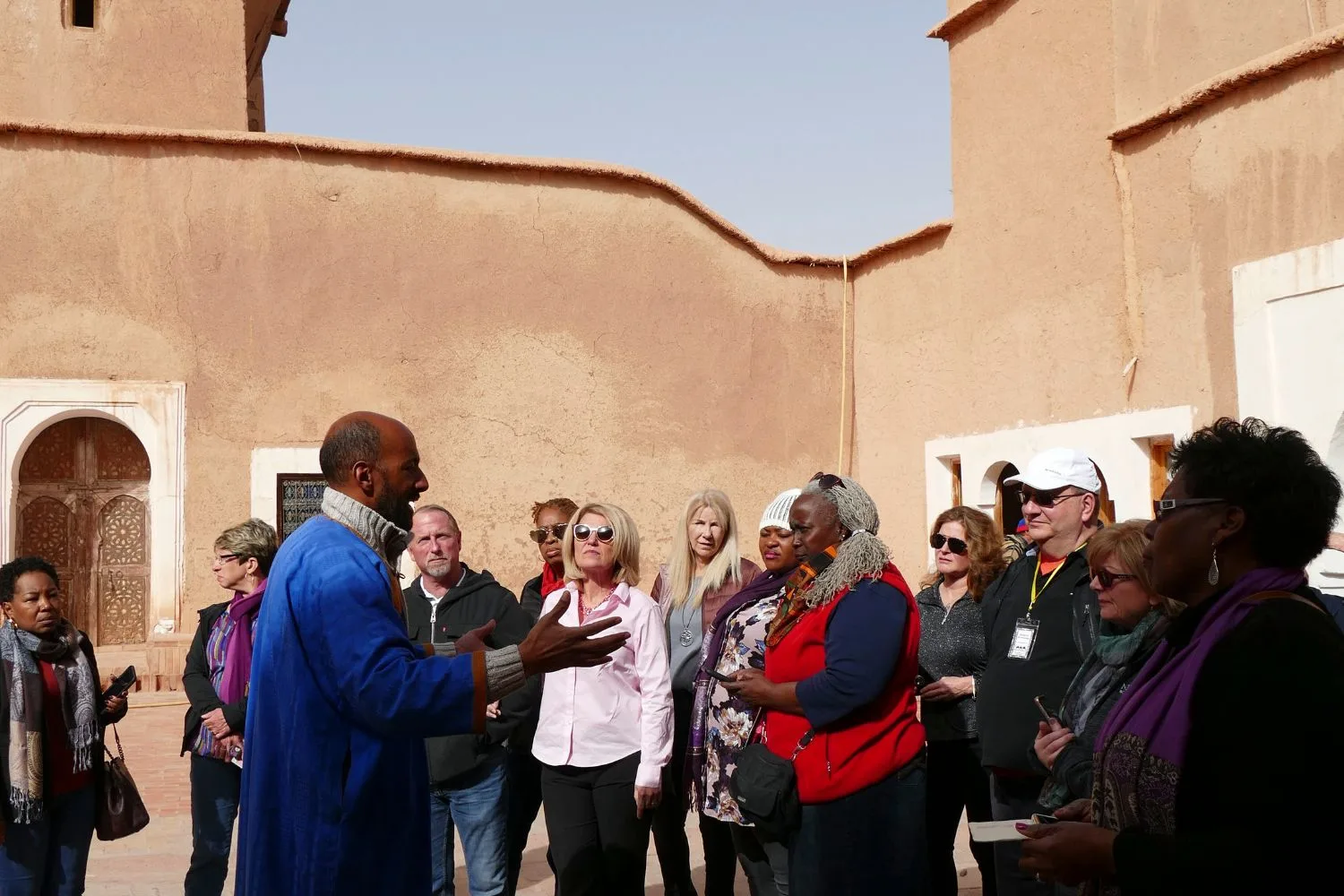 A local guide leads his tour group in Tangier, Morocco