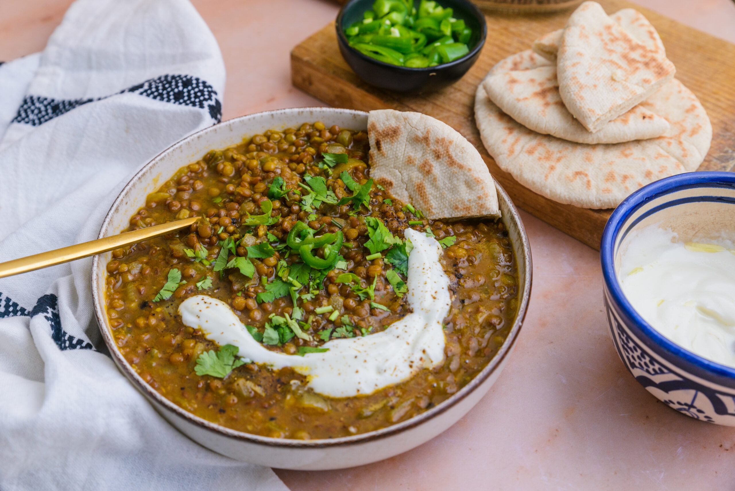 Yemeni Lentil Soup with bread and toppings