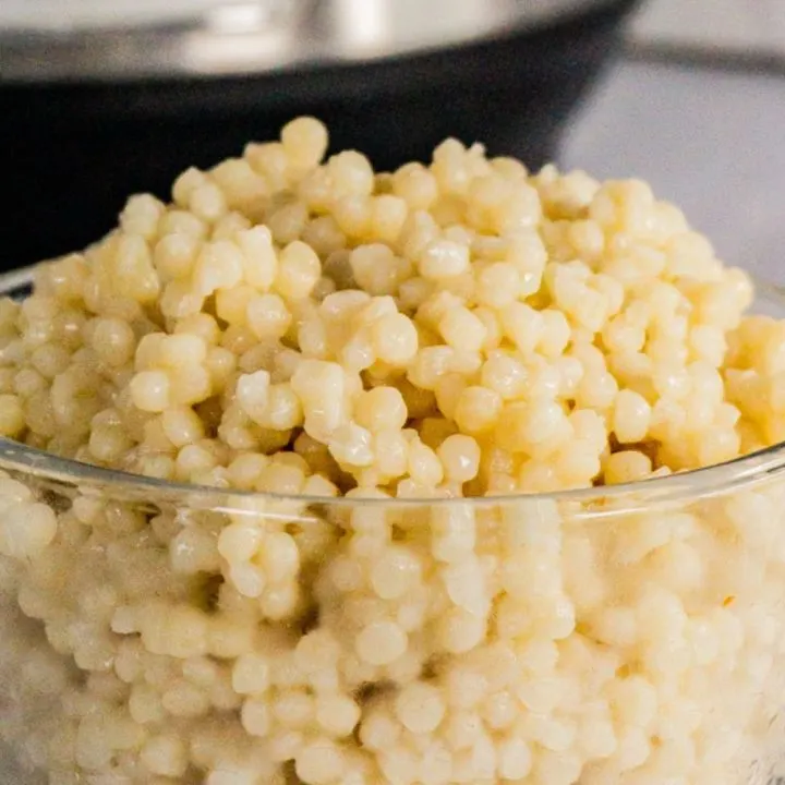 Instant Pot Couscous in a clear serving bowl