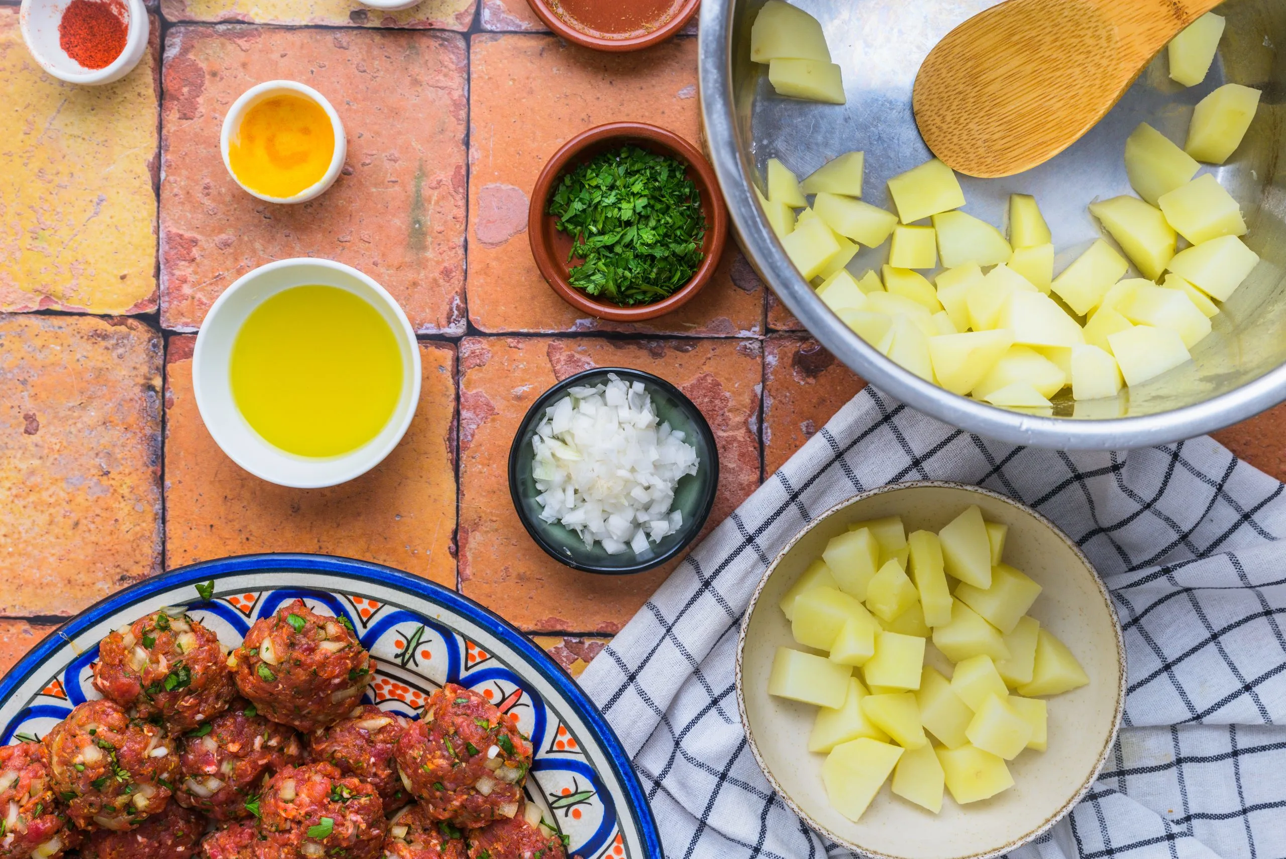 Preparing the potatoes in making Moroccan kefta and potatoes