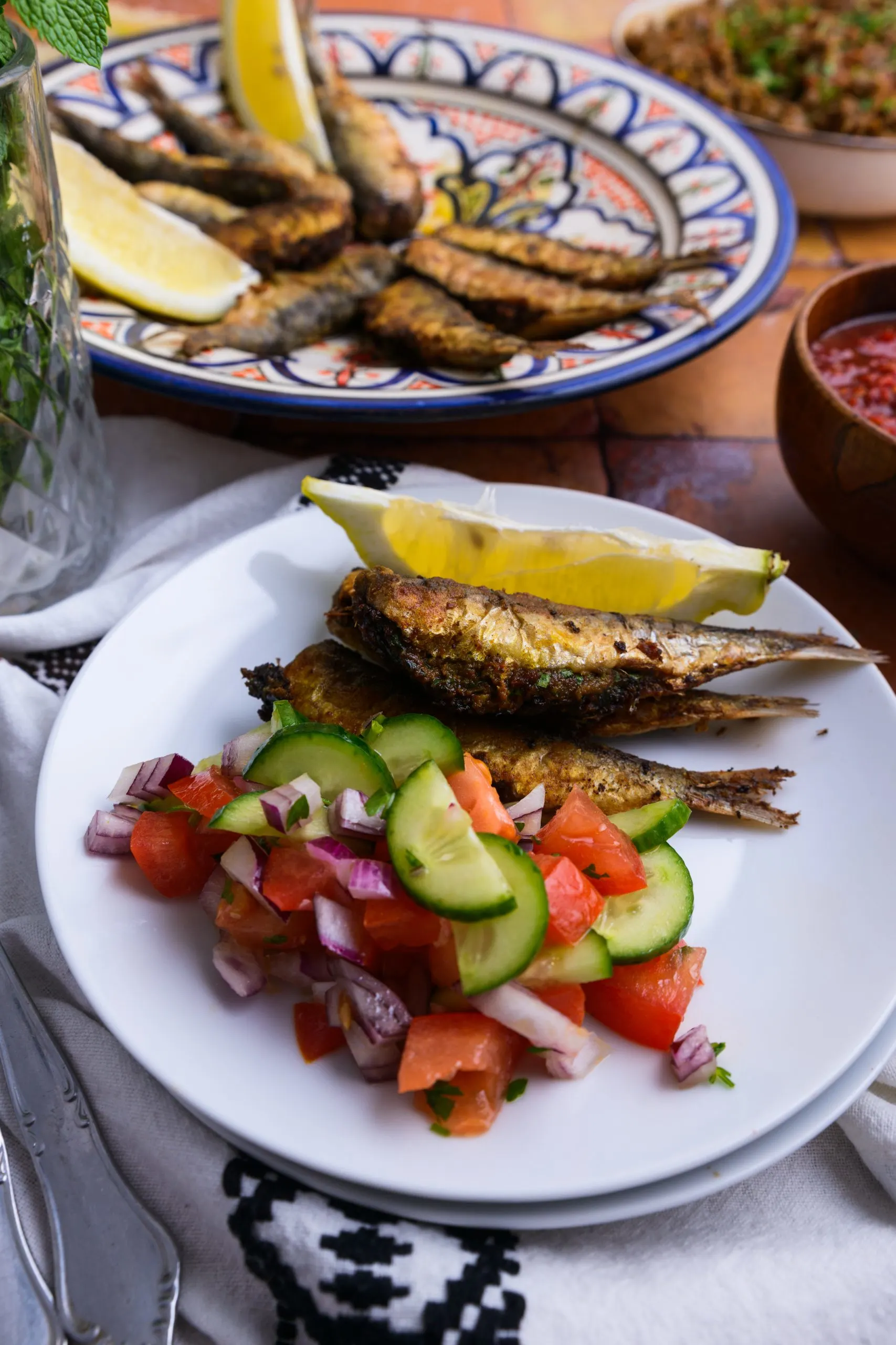 Moroccan stuffed sardines served on a white plate