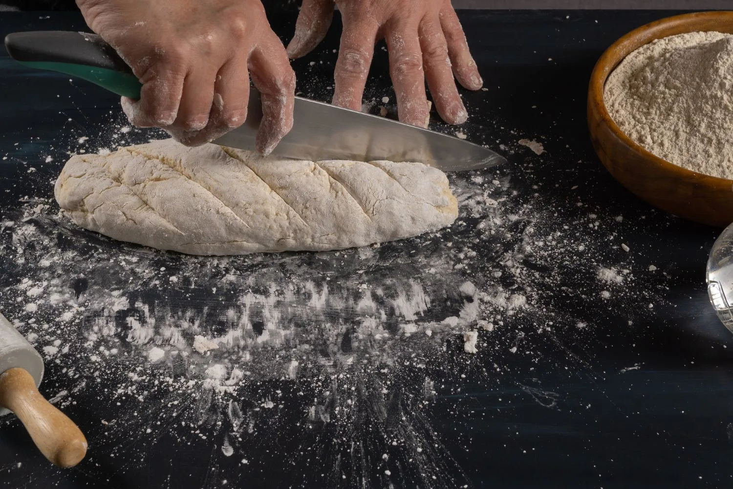 Kneading homemade bread Khobz with flour, water and salt